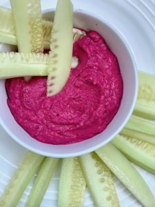 Beet and jalapeño hummus with cucumbers